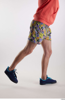 Nigel 1 blue sneakers dressed flexing floral printed shorts leg…